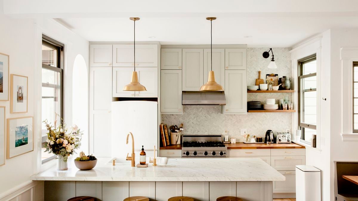 A modern farmhouse kitchen featuring a shiplap backsplash and open shelving