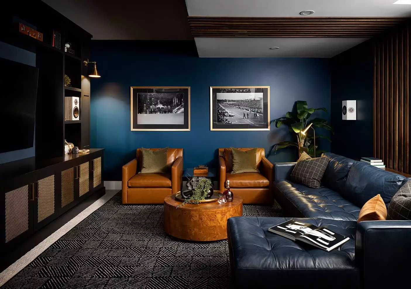 Living room accent wall painted in deep blue