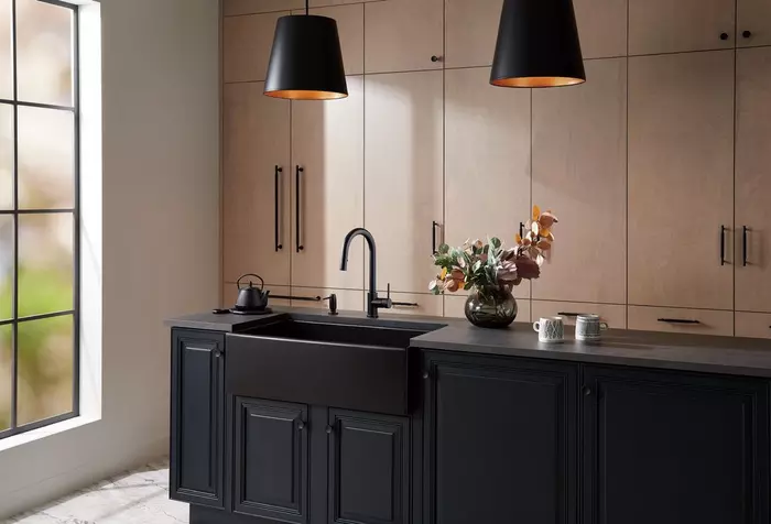 close-up of new kitchen cabinet hardware in matte black