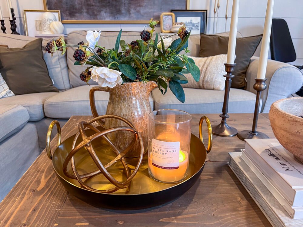 DIY coffee table decor with candles and books