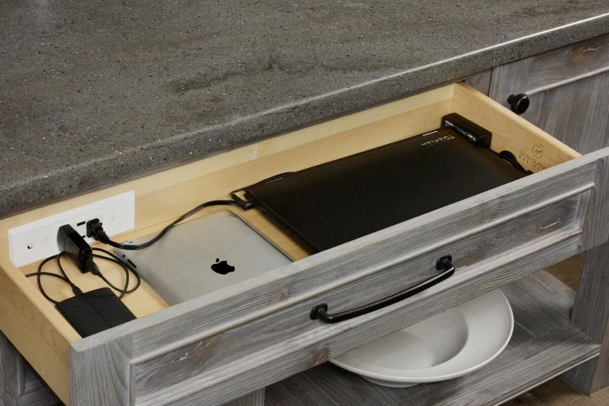 hidden outlet drawer in modern kitchen island