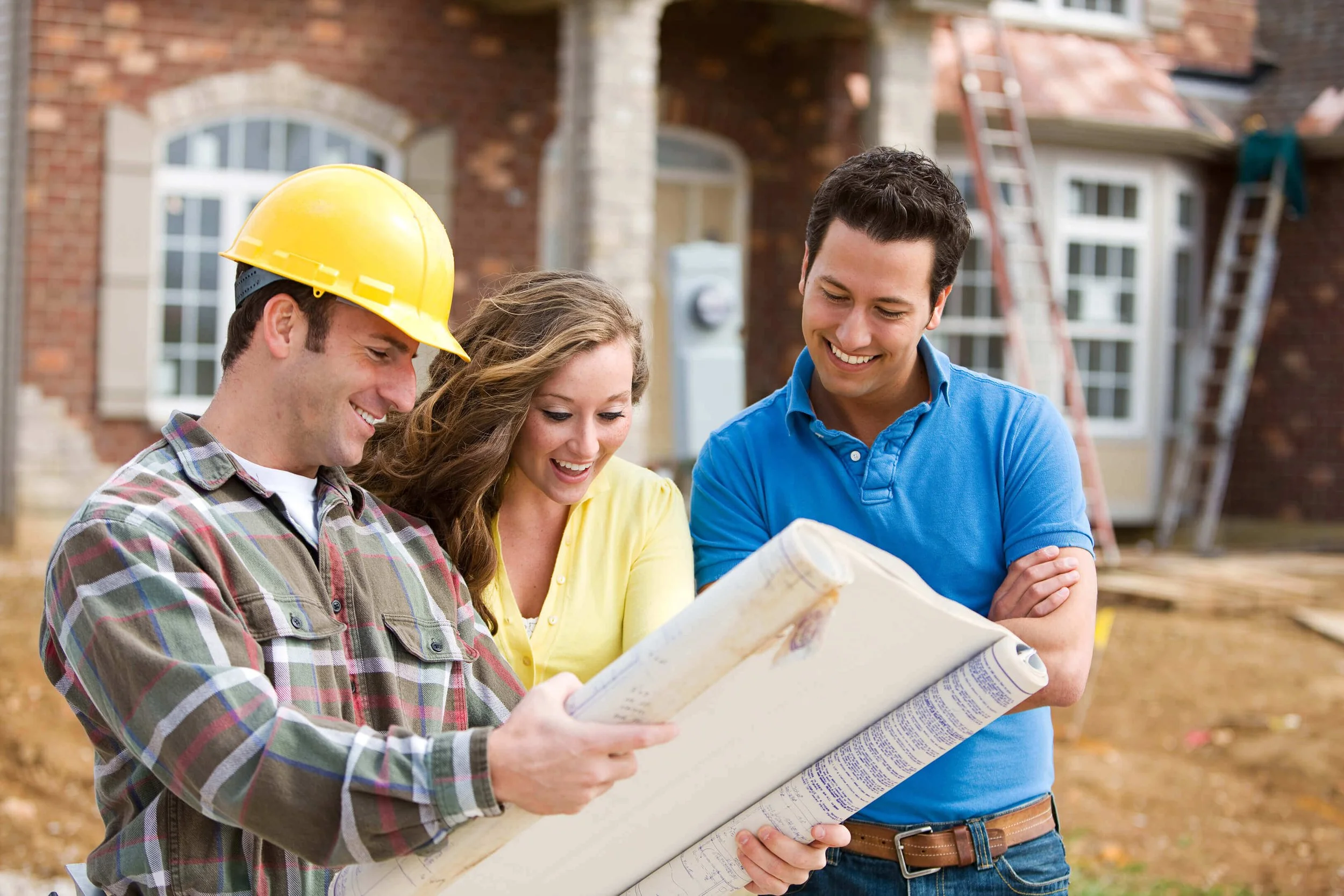 Professional home renovation contractor discussing plans with homeowner