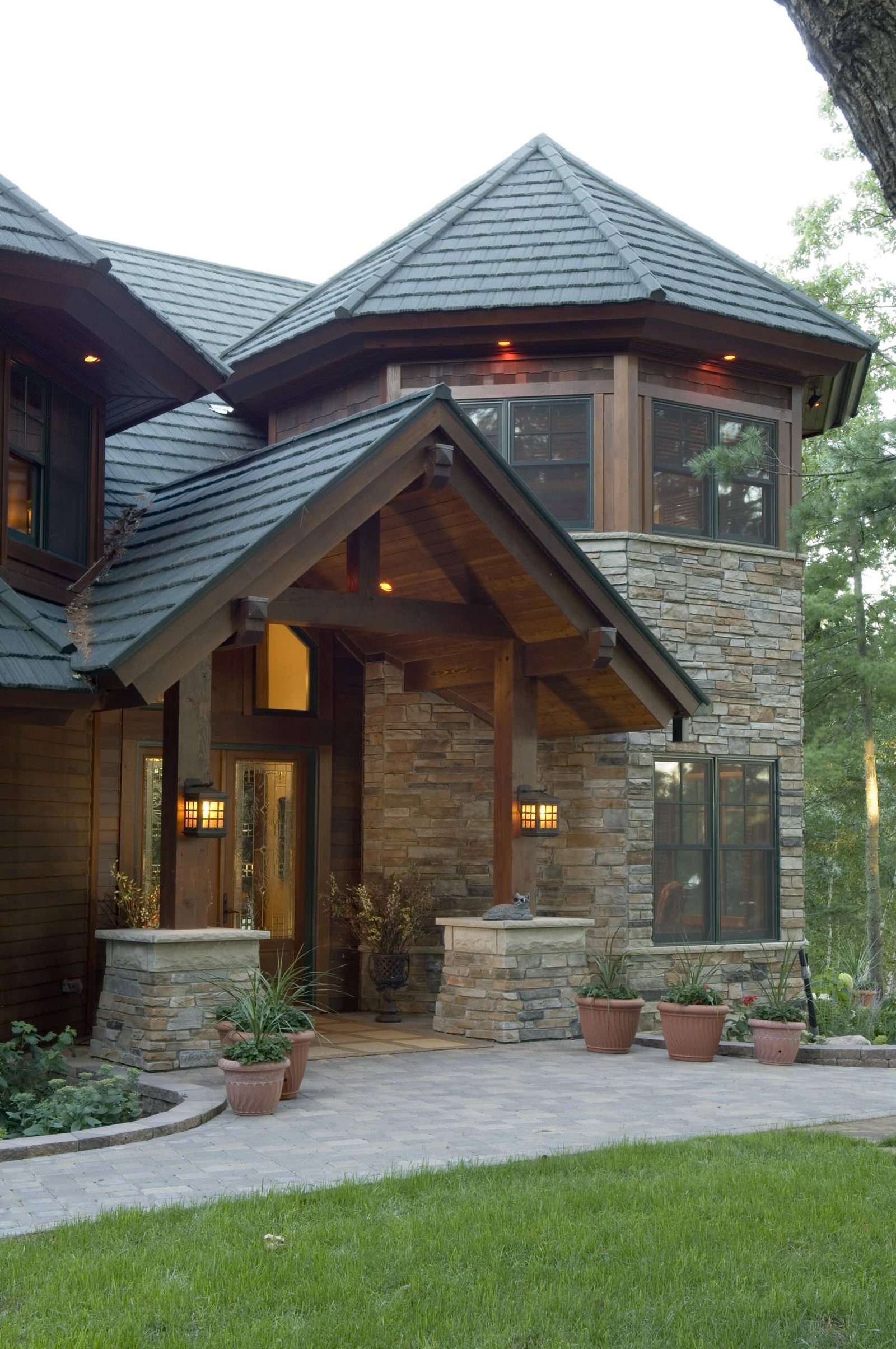 Home exterior design using wooden and stone materials