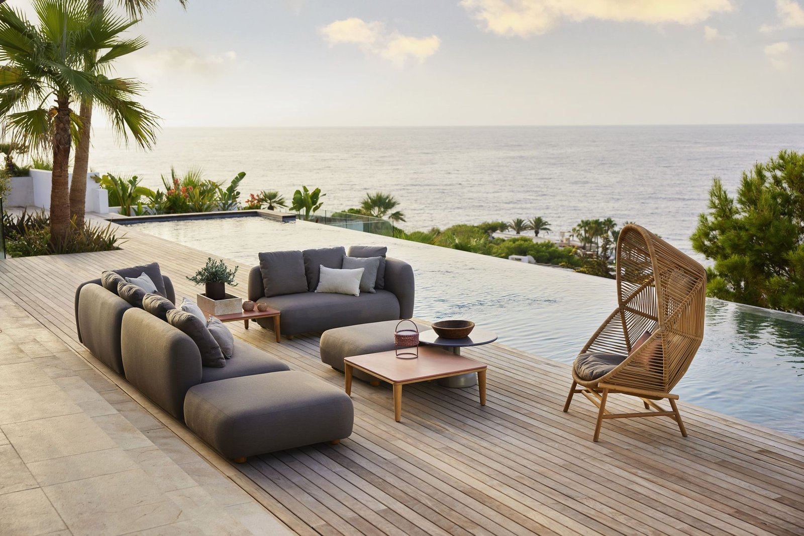 Outdoor furniture ideas for summer with modern patio setup and wooden chairs
